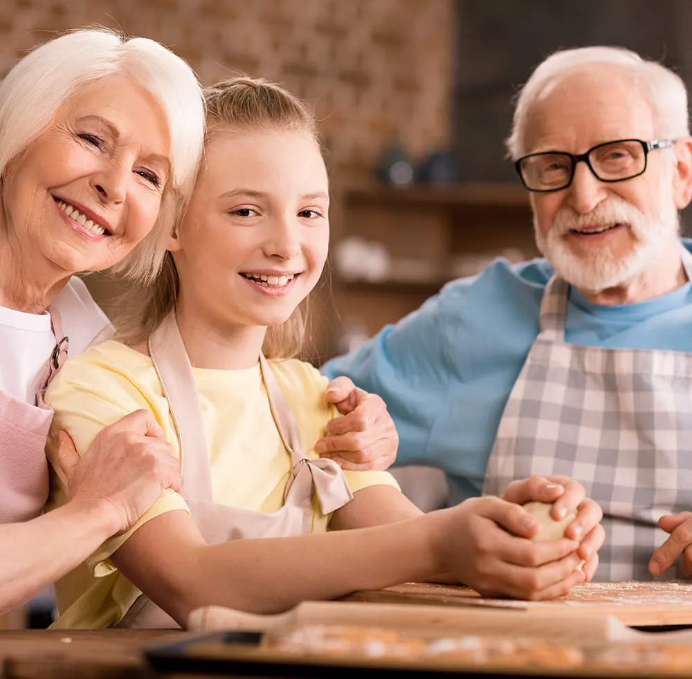 A group of people sitting around a table.