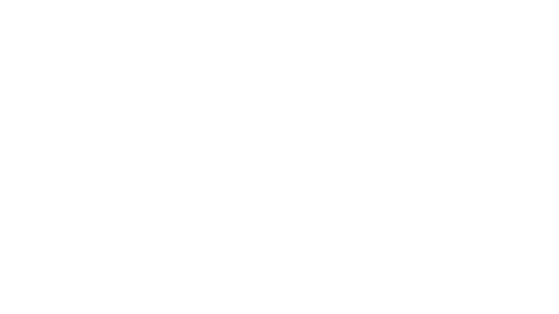A black and white image of a person in the middle of a video.
